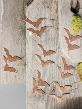 Load image into Gallery viewer, Copper bat earrings close-up: textured copper-brown bat silhouettes on hooks.