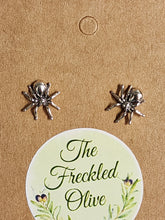 Load image into Gallery viewer, Sterling silver spider stud earrings on round card backing