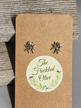 Load image into Gallery viewer, Sterling silver spider stud earrings on display card with two spiders shown