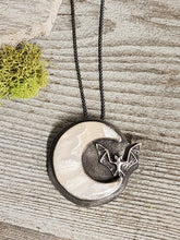 Load image into Gallery viewer, Round agate moon pendant with bat silhouette, black beaded cord necklace, silver rim