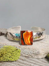Load image into Gallery viewer, Silver glass bracelet with square orange-and-black center, diamond-pattern band ends