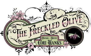 The Freckled Olive logo