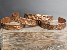 Load image into Gallery viewer, Copper textured bracelet, 1/2" wide, star and scallop embossing on hammered copper.