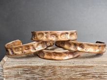 Load image into Gallery viewer, Copper textured bracelet, 1/2" wide, hammered links with star and oval embossing.