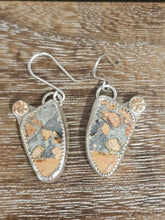 Load image into Gallery viewer, Pair of earrings with a natural stone design on a wooden surface