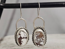 Load image into Gallery viewer, A pair of silver hoop earrings with wild horse stone inlays, displayed against a neutral background.