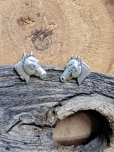Load image into Gallery viewer, Sterling silver horse head stud earrings with green enamel eyes