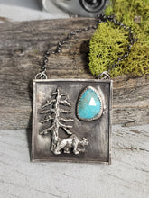 Load image into Gallery viewer, Silver square pendant necklace with tree-and-bear charm and turquoise teardrop inlay
