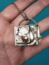 Load image into Gallery viewer, Silver-tone boot pendant necklace with square wild horse stone, worn on palm