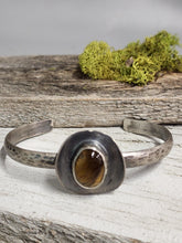 Load image into Gallery viewer, Tiger eye cowboy hat cuff bracelet, silver-tone band with oval stone in hat setting
