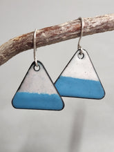 Load image into Gallery viewer, Blue and white enamel triangle dangle earrings hanging from a branch