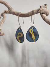 Load image into Gallery viewer, Blue teardrop enamel dangle earrings with yellow abstract marks and silver hooks