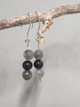 Load image into Gallery viewer, Dangling bead earrings featuring black onyx and gray moonstone spheres on hooks