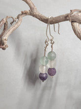 Load image into Gallery viewer, Drop earrings with mint, white, and purple fluorite beads on silver-tone hooks