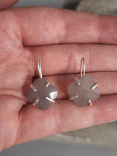 Load image into Gallery viewer, Clover drop earrings with pale gray chalcedony petals, shown close-up in open palm