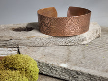 Load image into Gallery viewer, Rose copper cuff bracelet with engraved floral and leaf pattern, wide open ends
