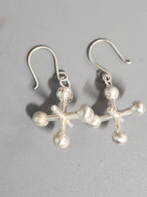 Load image into Gallery viewer, Pair of silver-tone cross drop earrings with bead clusters and circular top links