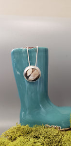 Petrified Peanut Wood Circle Stone Pendant