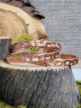 Load image into Gallery viewer, Copper textured cuff bracelet, 1/4 inch wide, embossed oval pattern, pair

